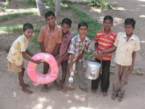 Students of Kandamangalam School with provided implements.